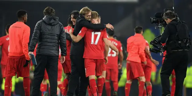 Jurgen Klopp and Ragnar Klavan celebrate Merseyside derby victory