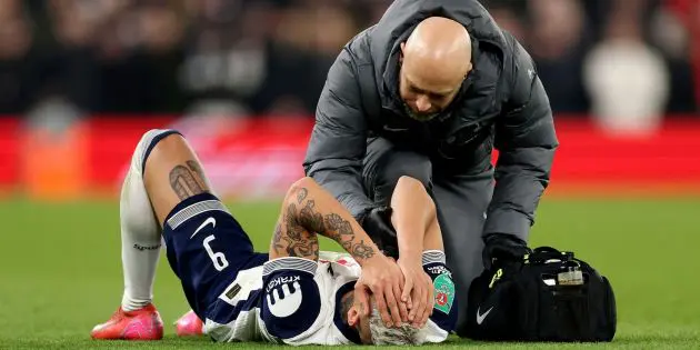 Richarlison lies injured at Anfield