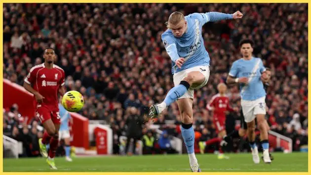 Ryan Gravenberch looks on as Erling Haaland has a shot at Anfield