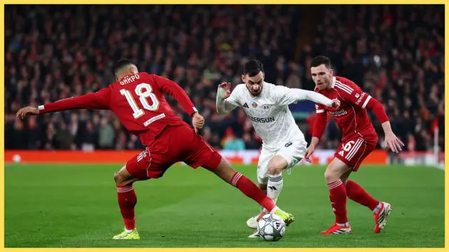 Marko Jankovic of Qarabag FK battles for the ball with Cody Gakpo and Andrew Robertson of Liverpool