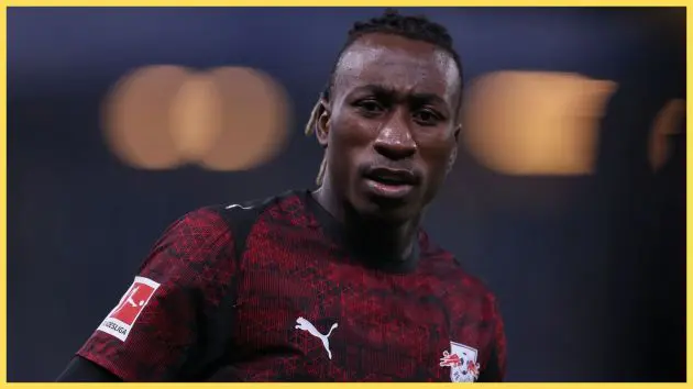 Yan Diomande frowns during RB Leipzig game.