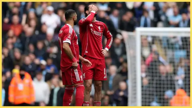 Mohamed Salah and Dominik Szoboszlai of Liverpool react after conceding the third goal, scored by Antoine Semenyo of Manchester City during the Emirates FA Cup Quarter Final match between Manchester City and Liverpool at Etihad Stadium