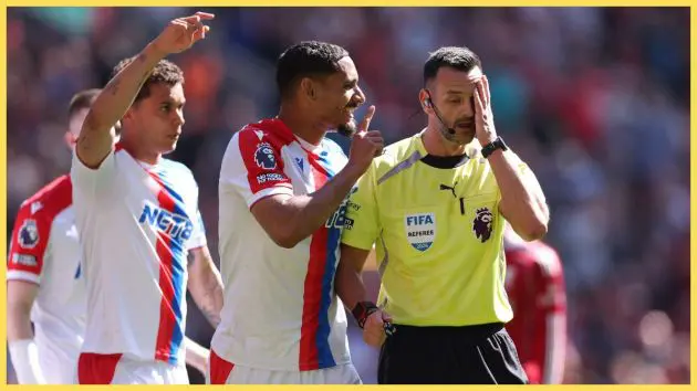 Maxence Lacroix of Crystal Palace talks with Referee, Andy Madley as he appeals to review a penalty that was later overturned following VAR review during the Premier League match between Liverpool and Crystal Palace at Anfield