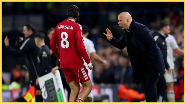 Arne Slot, Manager of Liverpool, gives instructions to Dominik Szoboszlai during the Premier League match between Leeds United and Liverpool at Elland Road
