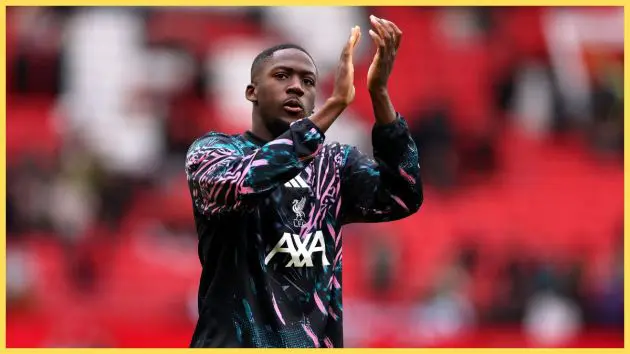 Ibrahima Konate of Liverpool acknowledges the fans during the warm up prior to the Premier League match between Manchester United and Liverpool at Old Trafford