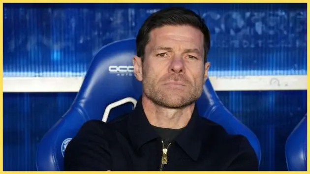 Xabi Alonso looks on from the bench.