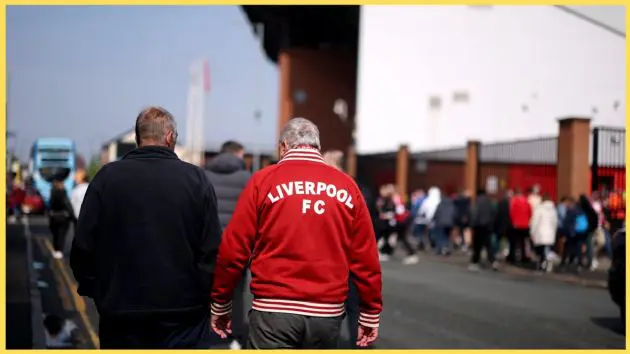 Liverpool fans make their way towards Anfield