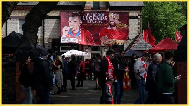 A banner near Anfield shows appreciation for Andy Robertson and Mo Salah