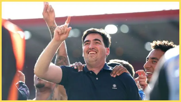 Liverpool manager Andoni Iraola points in the air.