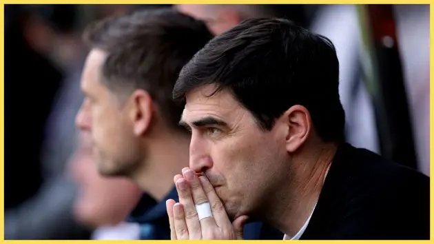 Liverpool manager Andoni Iraola puts his folded hands to his mouth.