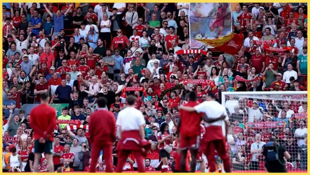 Liverpool fans applaud their team's players after a match at Anfield