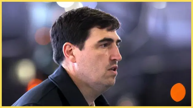 Liverpool manager Andoni Iraola looks on.