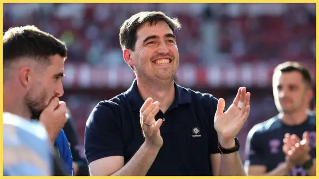 Liverpool manager Andoni Iraola claps his hands and looks delighted after Bournemouth game in the Premier League.