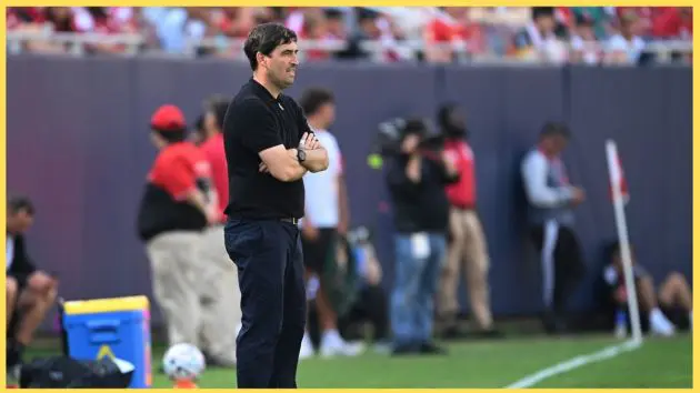Andoni Iraola watches on from the touchline during Liverpool's friendly against Leeds