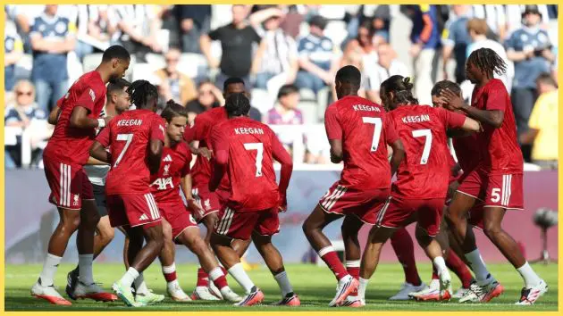 Liverpool plays wear training tops in tribute to Kevin Keegan before the game against Newcastle
