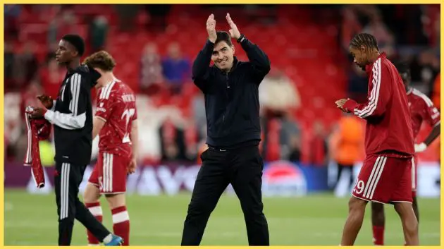 Andoni Iraola applauds the Liverpool fans after the Reds' win over Atletico Madrid