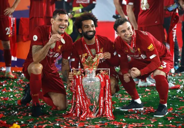 Dejan Lovren, Mo Salah and Xherdan Shaqiri brandish their Premier League winners' medals in 2020